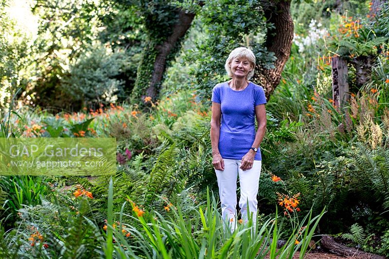 Pam Woodall in her wildlife garden - 'Pinecombe' in Dorset, UK