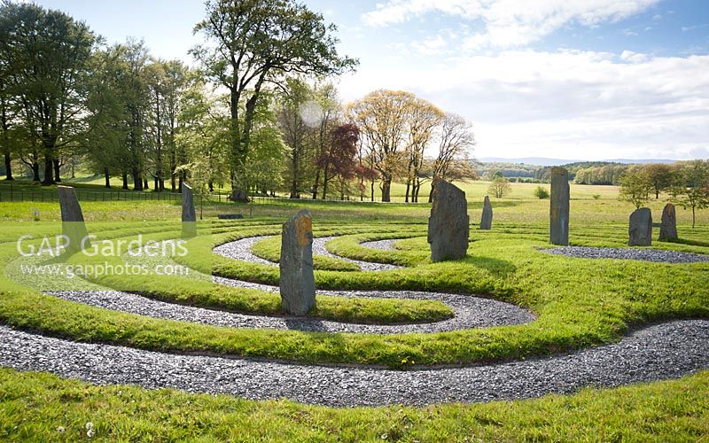 Labyrinth inspired by a Hindi temple design, with standing slate stones. Holker Hall, Grange over Sands, Cumbria, UK.