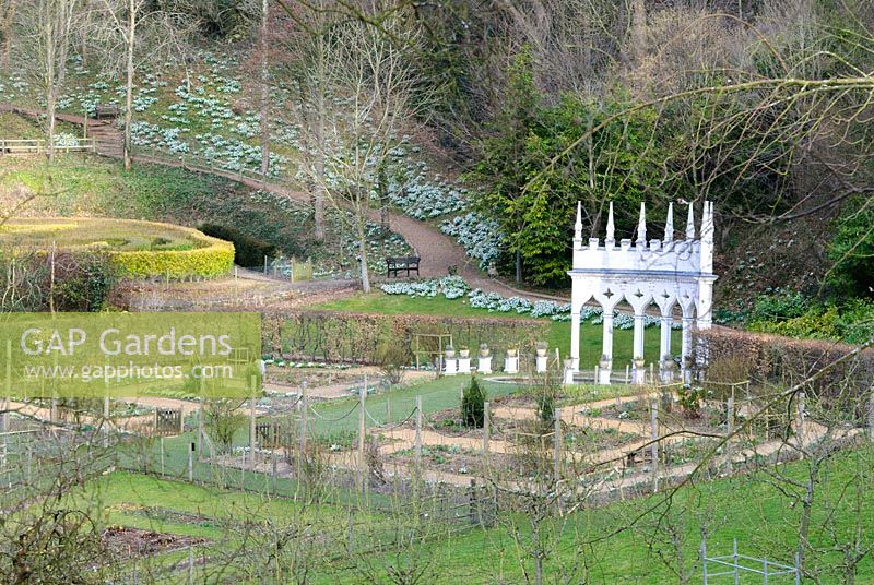Exedra at the head of the geometric kitchen garden. Painswick Rococo Garden, Painswick, Glos, UK. 