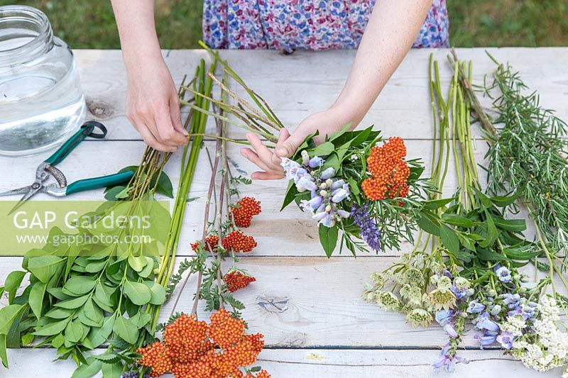 Selecting flowers and tying a bouquet