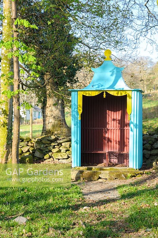 The Pagoda, a metal shelter in the shape of a small tent in the woods above Plas Brondanw, Penrhyndeudraeth, Gwynedd, Wales