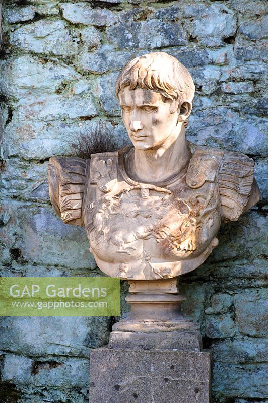 Bust of Roman soldier in a niche of Cupid's Folly. Plas Brondanw, Penrhyndeudraeth, Gwynedd, Wales