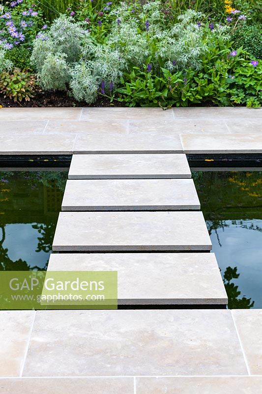 Detail shot of stepping stones. Garden designed by Peter Reader Landscapes.