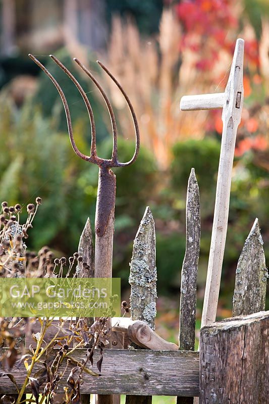 Garden tools - manure fork and scythe.