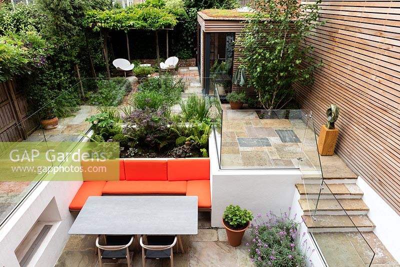View of modern, multi-level garden with sunken seating area.