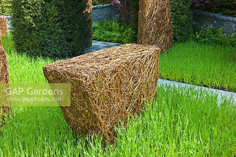 Woven willow structure withBarley. Stockton Drilling's 'As Nature Intended' garden, RHS Chelsea Flower Show
