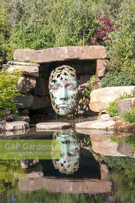 Contemporary sculpture by Simon Gudgeon, in Pool Garden designed by Peter Dowle. 
