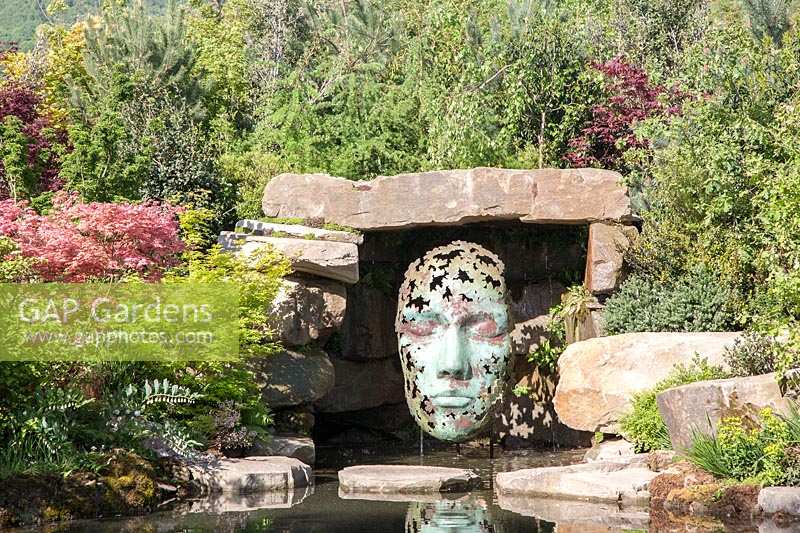 Contemporary sculpture by Simon Gudgeon, in Pool Garden designed by Peter Dowle.
