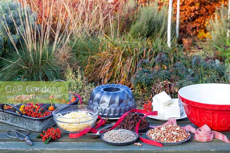 Tools and ingredients for making a bundt cake bird feeder.