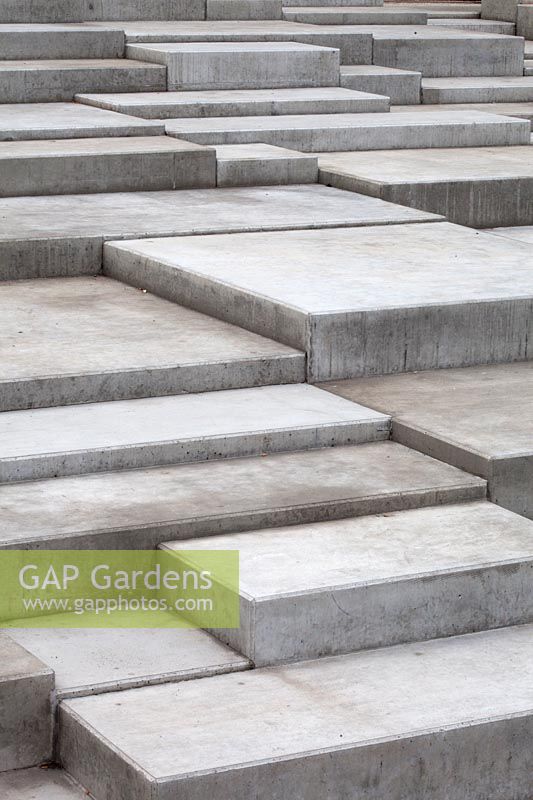 Tiered concrete blocks for walking over or sitting
