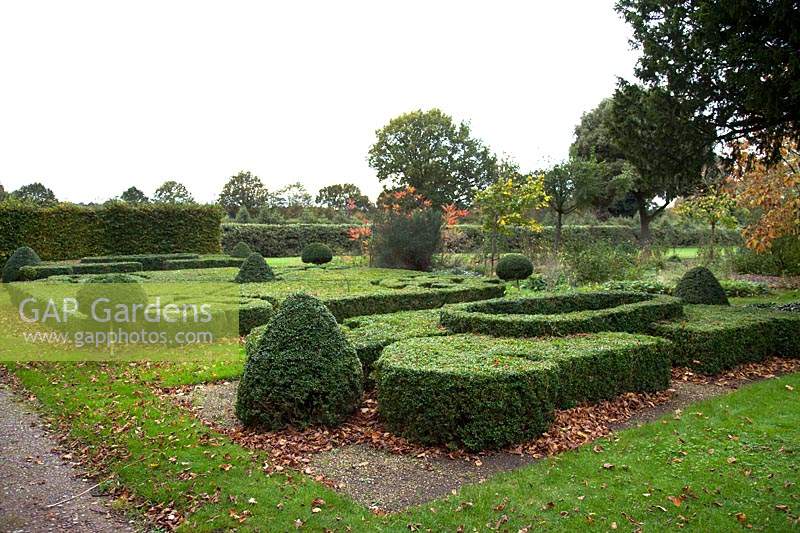 Box edging clipped into topiary shapes and knot patterns at Castle Bromwich Hall Gardens, UK.
