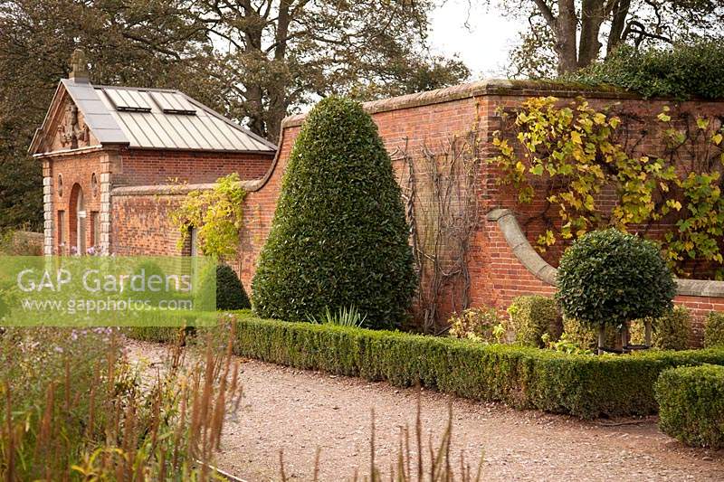 Formal borders and paths by Orangery at Castle Bromwich Hall Gardens, UK.