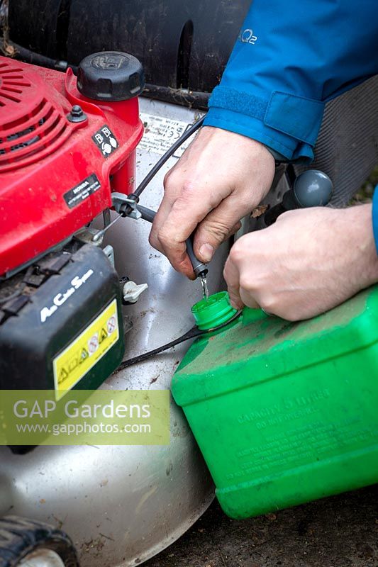 Lawnmower maintenance, draining the petrol tank before storing petrol mower