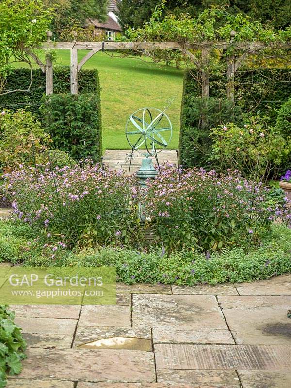Sundial in The Rose Garden, Little Malvern Court, UK.