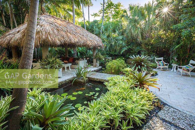 The chickee hut in tropical garden. The Jones Residence, Key West, Florida, USA. Garden design by Craig Reynolds.