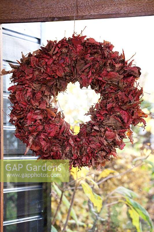 Wreath made from red foliage.