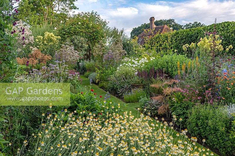 The Mixed Herbs and Perennials Garden at Town Place in Sussex, UK. 