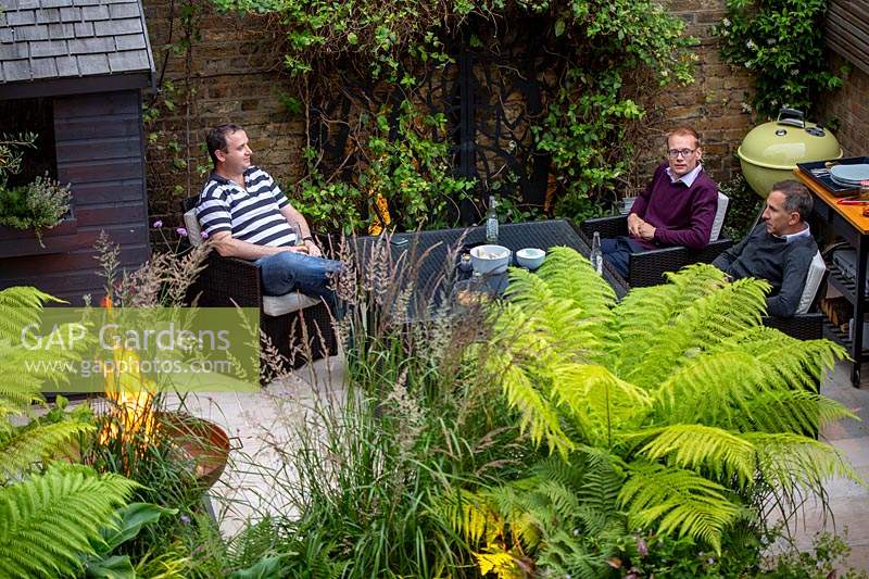 Barbecue with Justin Edwards and friends in his green oasis garden in West London.