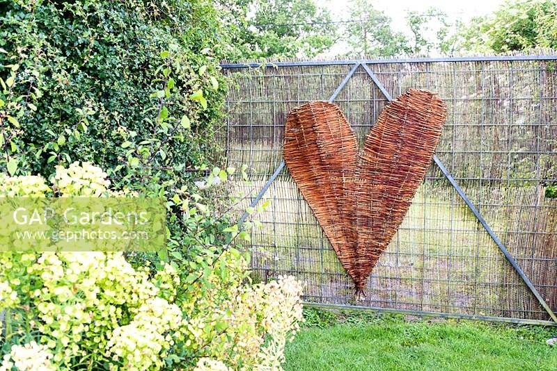 A woven Salix - Willow - heart on a gate 