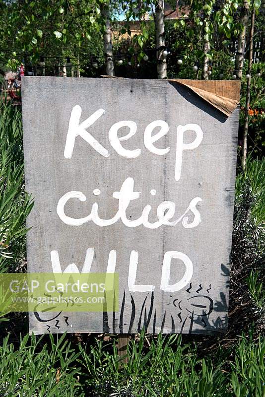Keep Cities Wild sign at Dalston Eastern Curve Garden, an urban community garden in the London Borough of Hackney.