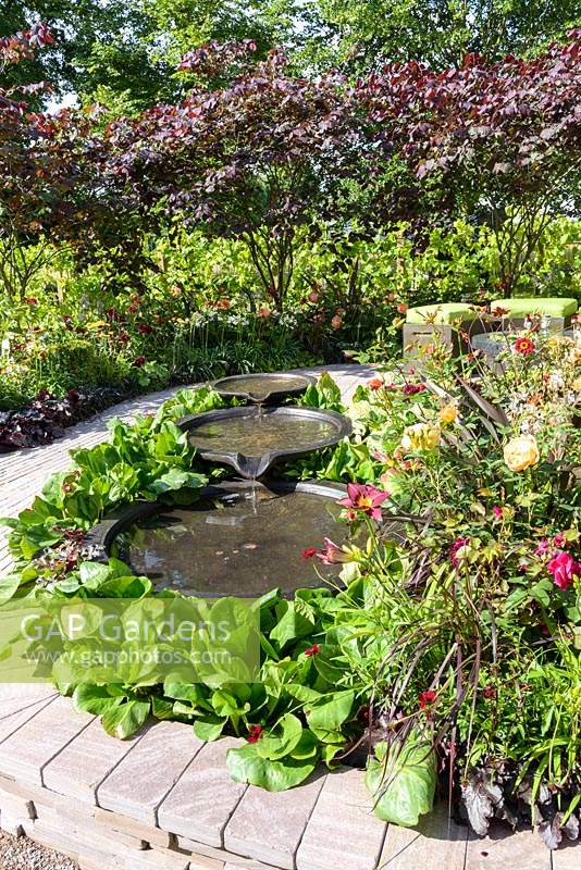 Bachus Garden - three tiered circular pools - RHS Hampton Court Flower Show 2014.