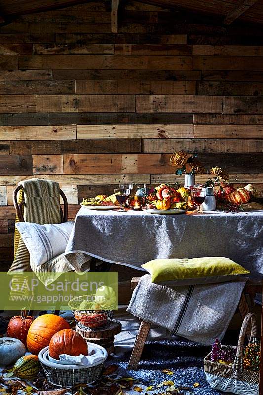 Autumnal table setting with rich colours.