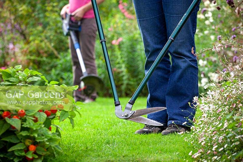 Alternative lawn edging equipment options - mechanical long handled edging shears or electric edge trimmer