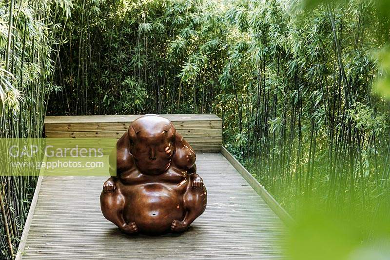The philosopher in the posture of a Buddhist monk by Dashi Namdakov in Jardin Zen. Les Jardins d Etretat, Normandy, France