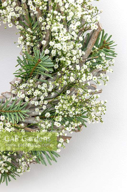 Wreath made with twigs, Gypsophila - Baby's Breath and conifer foliage