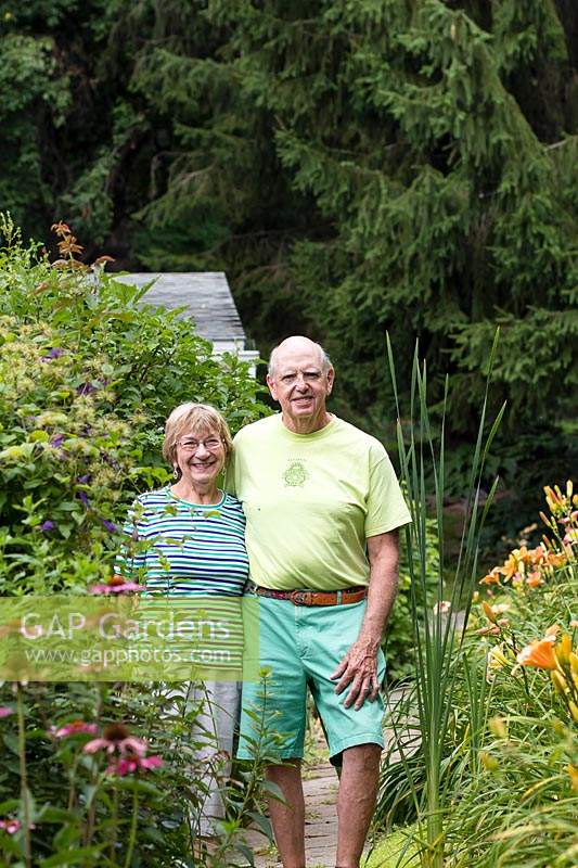 Homeowners Mike and Anita Sheehan in their country garden