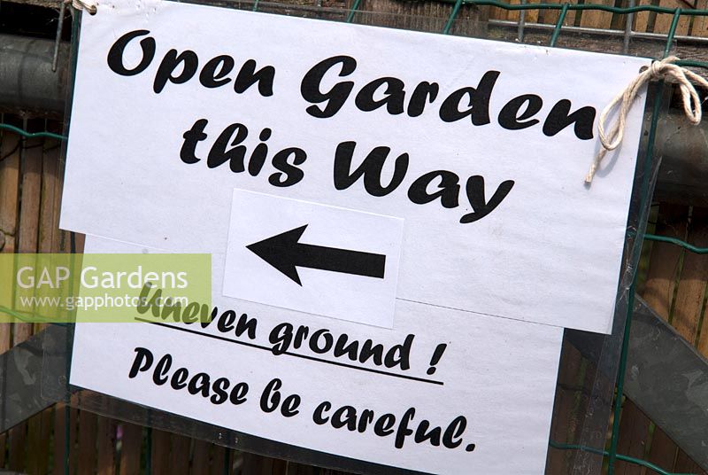 Open Garden sign with safety message