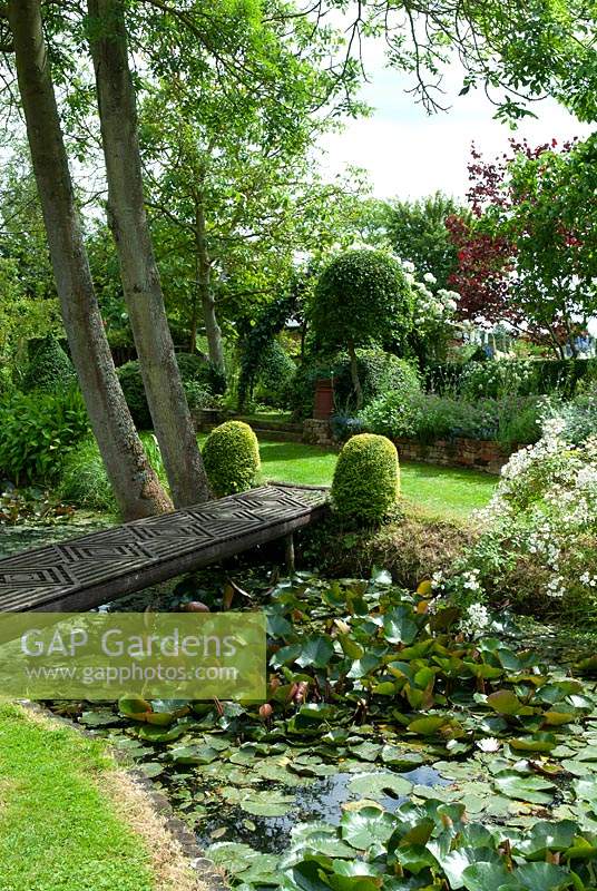 Garden pond with footbridge over - Open Gardens Day 2014, Cratfield, Suffolk