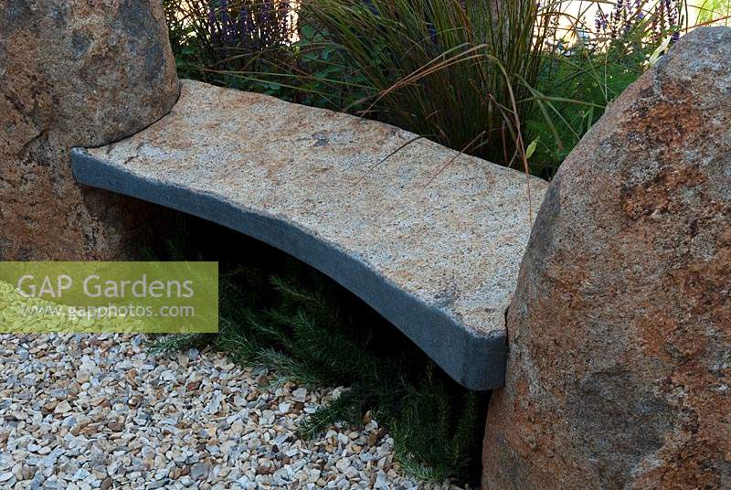 Granite boulders forming ends of garden bench - RHS Chelsea Flower Show
