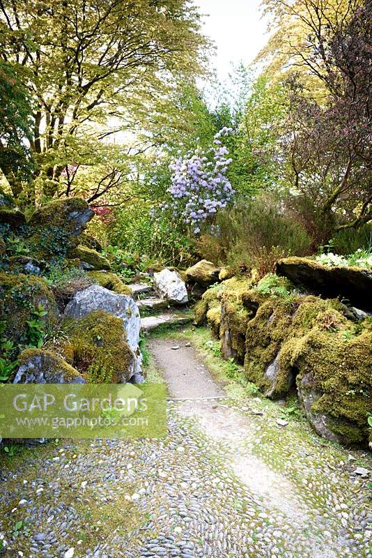 The Rockery criss-crossed by a network of pebbled paths at Hotel Endsleigh, Devon.