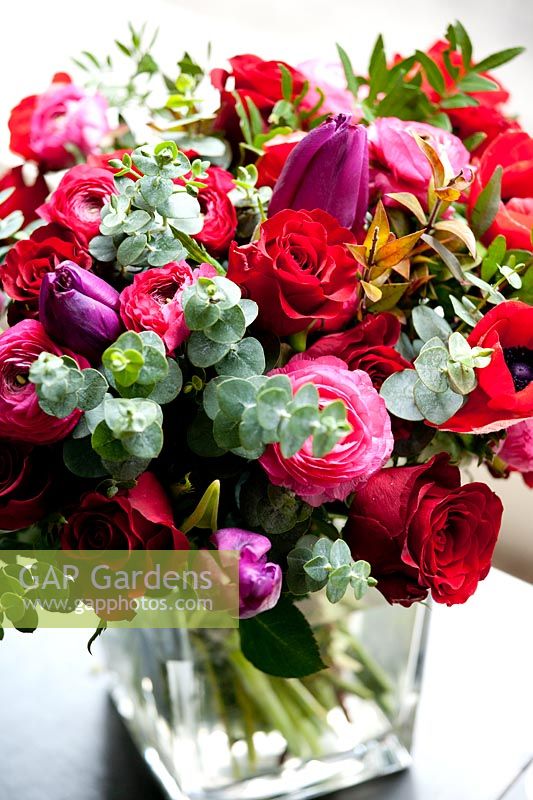 Floral bouquet using tulips, roses, eucalyptus leaves and Anemone.