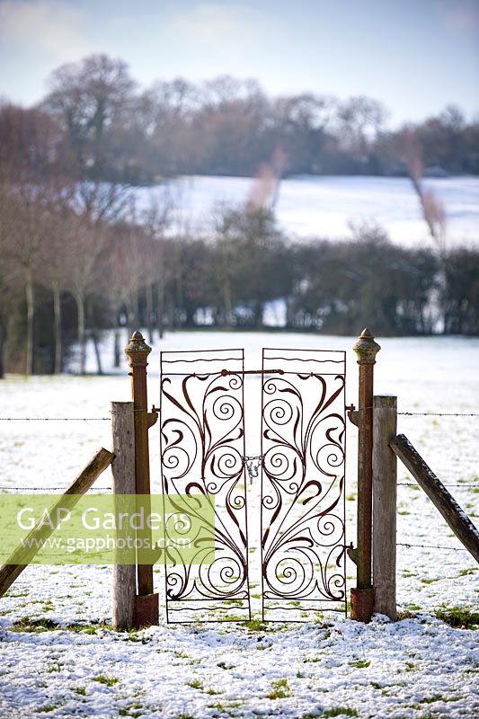A pair of wrought iron gates leading nowhere at Beckley Park, Oxfordshire.