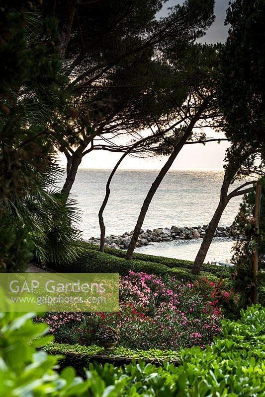 Formal gardens with ocean view, at Villa Agnelli Levanto, Italy.