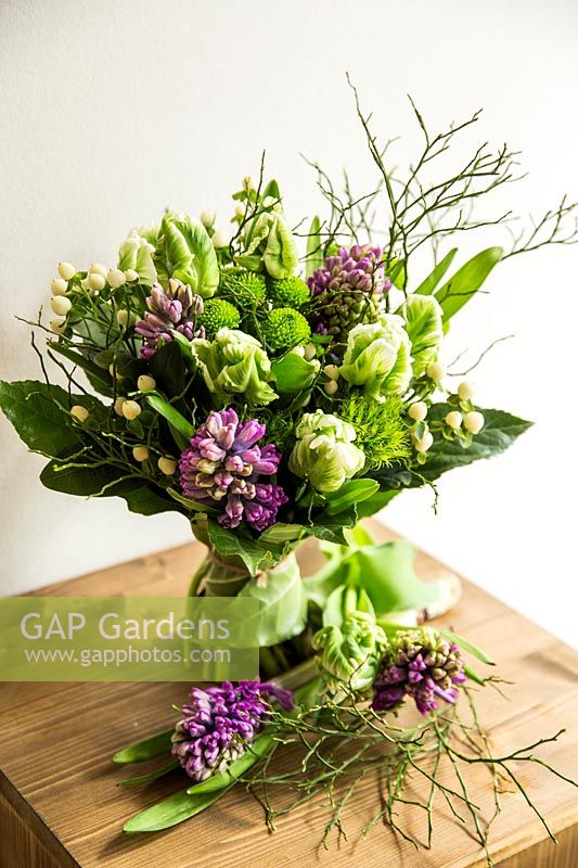 Floral bouquet with parrot tulips, Chrysanthemums, Hyacinths and Hypericum. 