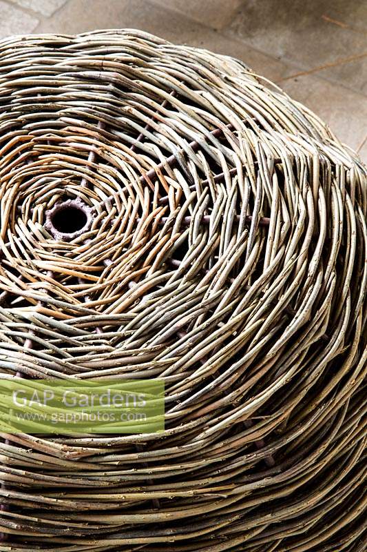 Top of a round table or chair showing flat top of circular woven Salix - Willow