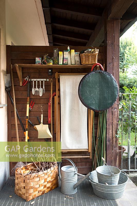 A corner for storing garden tools, equipment and deckchair