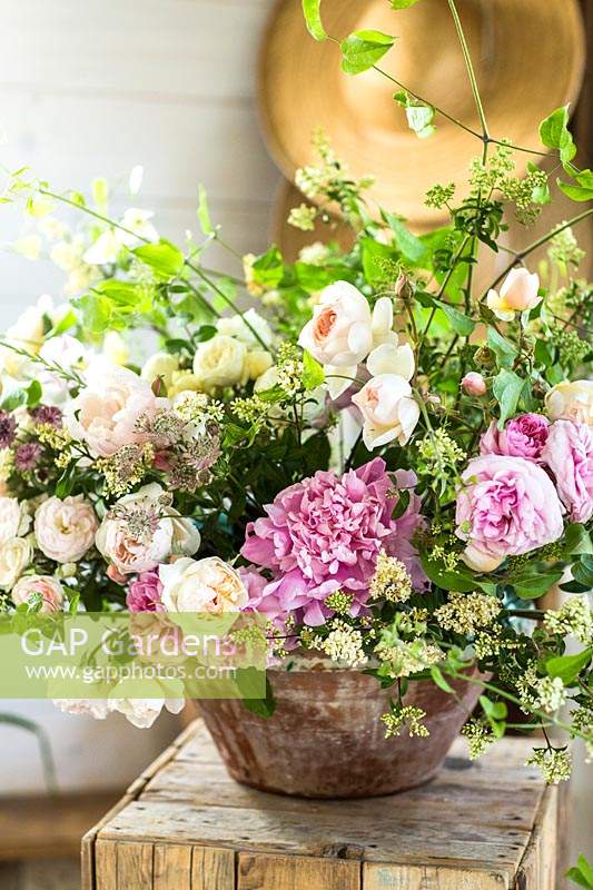 Mixed cut flowers: Rosa - Rose, Astrantia, Ligustrum and Clematis