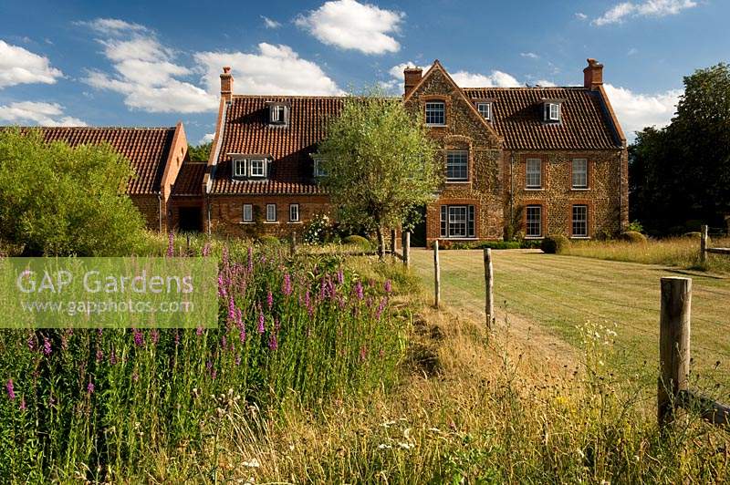 View of large country house in summer 