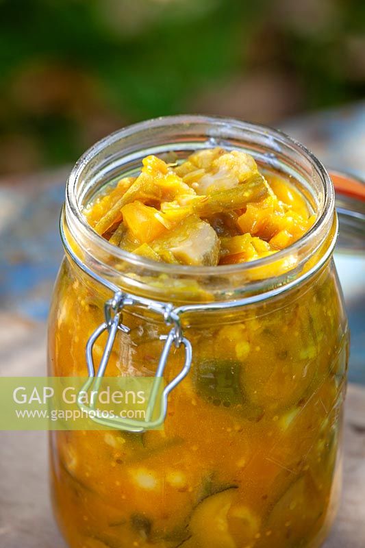 Piccalilli - garden pickle - in a kiln jar. Ingredients include: cauliflower, courgette, cucumber, turmeric and mustard