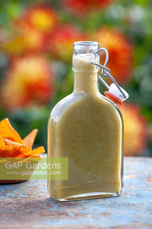 Garcia's green Chilli sauce in a bottle with tortilla chips