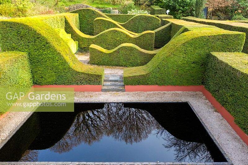  View over the Reflecting pool and Hedge Gardens. Pool water is dyed black. Hedges are of Taxus baccata. 