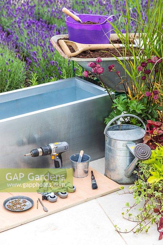 Materials, tools and plants required to make and plant up a zinc trough planter on casters