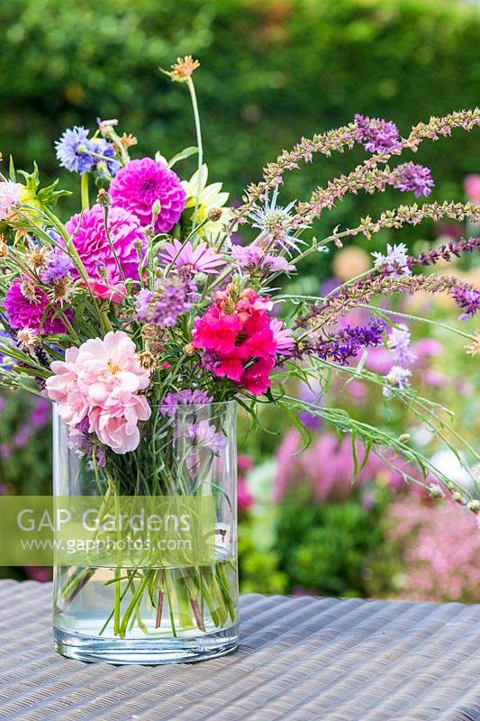 Bouquet of garden flowers on table