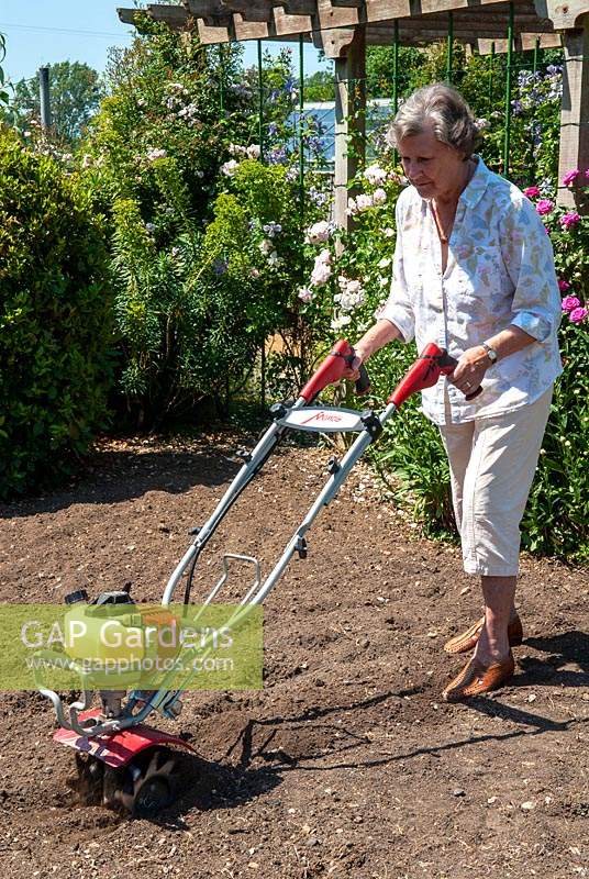 Image of Mantis Tiller woman gardening