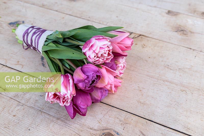 Spring floral bouquet of mixed Tulips with hessian and matching ribbon