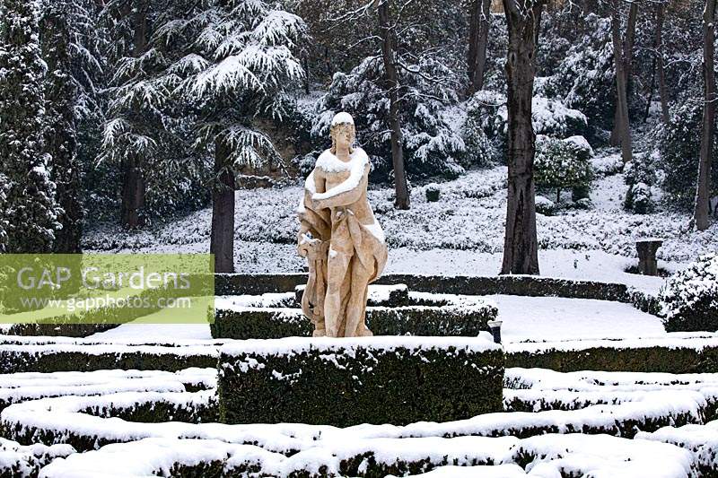 Statue in a French-style parterre